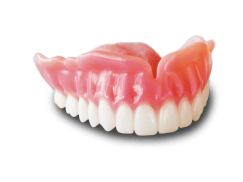 Conventional dentures forming a closed mouth on a tray provided by a dental lab